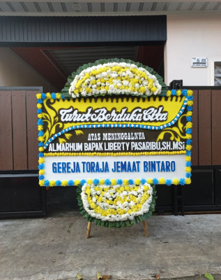 Papan Bunga Duka di Wangunsari